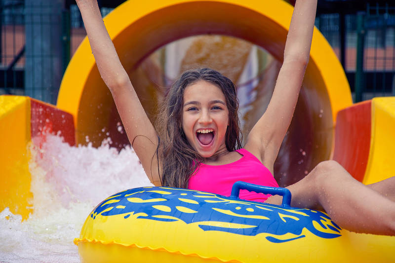 Kid-sliding-on-Water-Slide-at-Raging-Waters-San-Dimas-which-is-among-the-best-waterpark-in-the-United-States