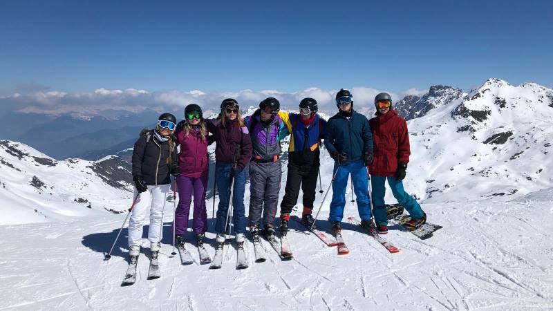 A-group-of-skiers-on-top-of-a-mountain-as-part-of-Skiing-destinations