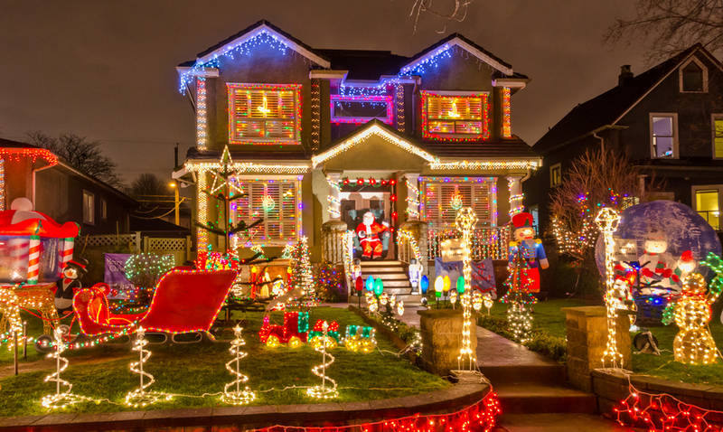 traditional-ways-celebrate-christmas in america-driving-neighborhood-christmas lights