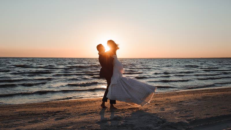 Newly-married-couple-dancing-on-the-beach-valentine-day-traditions