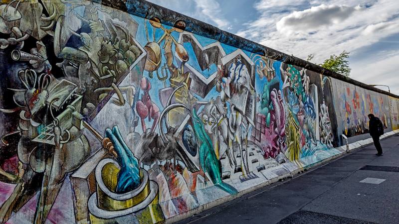 View of Berlin wall with graffiti on it - Berlin Sightseeing 