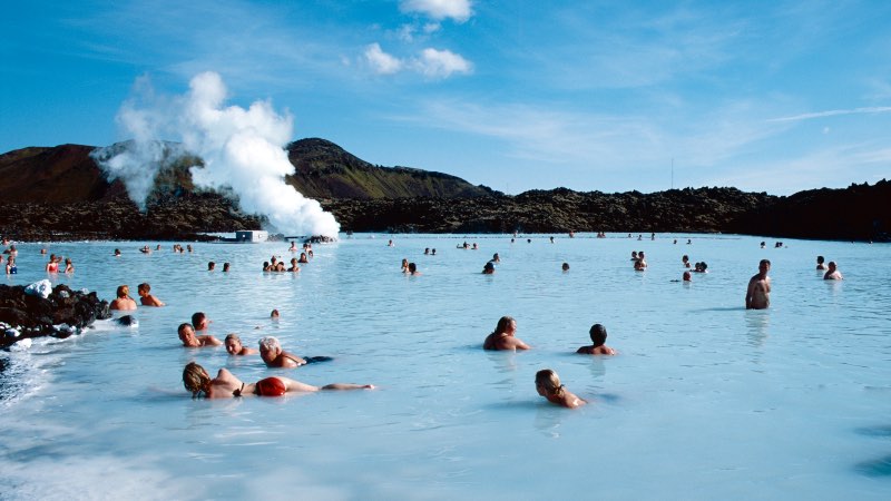 View of people relaxing in the hot waters of the Blue Lagoon near Reykjavik