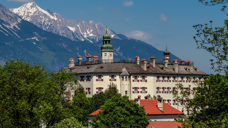 View of the castle with the mountains in the background